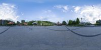 this is a view of a park from the ground of an upside down photo taken by a fish eye lens