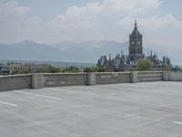 a parking lot and wall are pictured in a photo from the perspective point of view