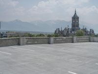 a parking lot and wall are pictured in a photo from the perspective point of view