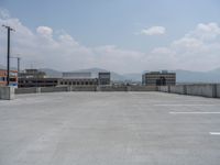 a parking lot and wall are pictured in a photo from the perspective point of view