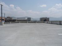 a parking lot and wall are pictured in a photo from the perspective point of view