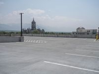 a parking lot and wall are pictured in a photo from the perspective point of view