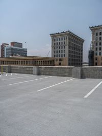 a parking lot and wall are pictured in a photo from the perspective point of view