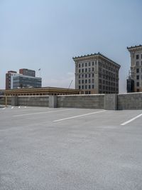 a parking lot and wall are pictured in a photo from the perspective point of view