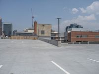 a parking lot and wall are pictured in a photo from the perspective point of view