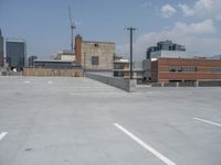 a parking lot and wall are pictured in a photo from the perspective point of view