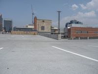 a parking lot and wall are pictured in a photo from the perspective point of view