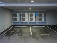 a parking garage with several air conditioners parked in it's floor and walls