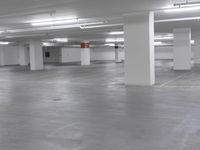 a large parking garage is empty and ready for customers to use the space for storage