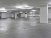 a large parking garage is empty and ready for customers to use the space for storage