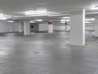 a large parking garage is empty and ready for customers to use the space for storage