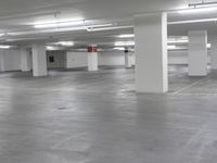 a large parking garage is empty and ready for customers to use the space for storage