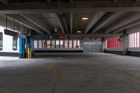 the inside of a parking garage with only red and white painted wallpapers in it