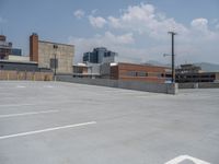 a parking lot and wall are pictured in a photo from the perspective point of view