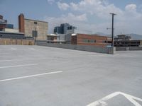 a parking lot and wall are pictured in a photo from the perspective point of view