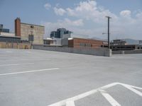 a parking lot and wall are pictured in a photo from the perspective point of view