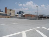 a parking lot and wall are pictured in a photo from the perspective point of view