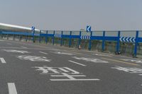 an airport parking lot with car parking spaces on the opposite sides of it in china