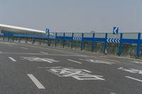 an airport parking lot with car parking spaces on the opposite sides of it in china