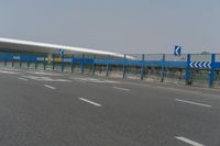 an airport parking lot with car parking spaces on the opposite sides of it in china
