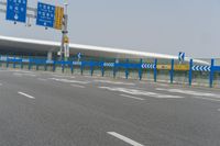 an airport parking lot with car parking spaces on the opposite sides of it in china