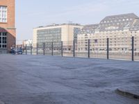 Parking Lot in Berlin: Reflections on Water and Asphalt