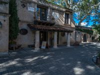 the patio at this winery store is nice and inviting on this warm fall day the brick pavement runs through the patio