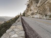 this paved mountain road is a scenic sight for cyclists and walkers, which are very steeped