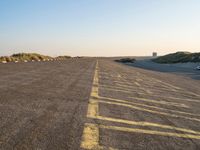 Peaceful Dawn in Holland: Beach, Ocean, and Road