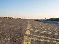 Peaceful Dawn in Holland: Beach, Ocean, and Road