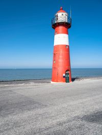 A Peaceful Day at the Beach in Holland: Clear Sky and Calm Water