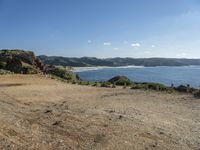 Picturesque Beach by the Ocean with Clear Sky