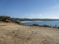 Picturesque Beach by the Ocean with Clear Sky
