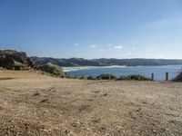 Picturesque Beach by the Ocean with Clear Sky