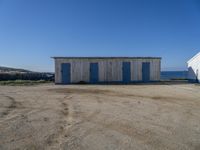 Picturesque Coast of Portugal: Sandy Shore with Buildings