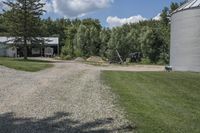 Picturesque Farmhouse Surrounded by Vegetation