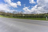 Picturesque Road in Ontario with Tree and Fence