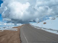 a person is on the top of a ramp on a steep hill by the ocean