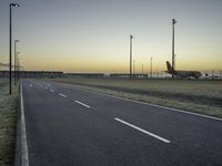 Plain Asphalt Road Landscape at Dawn