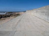 Porto Beach View: The Ocean and Concrete Wall