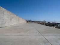 Porto's Coastal Concrete Wall and Beach View