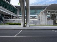 an outdoor space with a building on either side and a sky background that says air quality