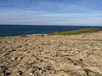 Portugal Beach: Relaxing on the Sandy Shores with a Clear Sky and an Ocean View