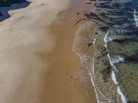 Portugal Coast: Azure Waters and Sandy Shore