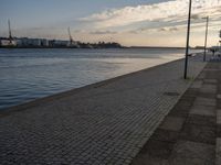 Portugal's Coastal Harbor: Cobblestone Pier Views