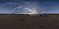 the view from inside a fish eye lens of the ocean and sky in the background