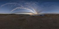 the view from inside a fish eye lens of the ocean and sky in the background