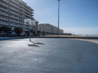 Portugal's Coastal Line: Clear Sky, Beach, and Basketball