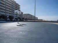 Portugal's Coastal Line: Clear Sky, Beach, and Basketball