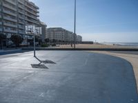 Portugal's Coastal Line: Clear Sky, Beach, and Basketball